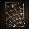 Fenstergitter als Spinnennetz mit einer Spinne aus Bronze