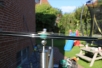 Kellerüberdachung aus Glas und Edelstahl