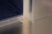Diese Tombak Blende fasst einen Kamin