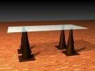 Tisch mit Untergestell aus Pylonen, in Bronze gegossen