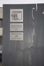 Firmenschild Schild aus Stahl mit einer Kavernenkontur für die SOCON SONAR CONTROL Kavernenvermessung GmbH in Emmerke.