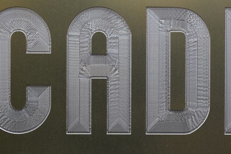 Werbeschild "CADFEM" mit Gravur