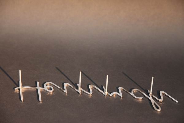 Vereinfachte Ausgangsschrift aus hochwertigem Edelstahl gelasert - Edelstahl Schriftzug