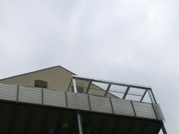 Glas Schiebedach - Terrassenüberdachung mit Glasfüllung für einen Balkon im 5. Stock