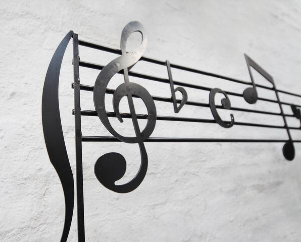 Dekoratives Notenrelief aus 3mm Stahlblech gelasert