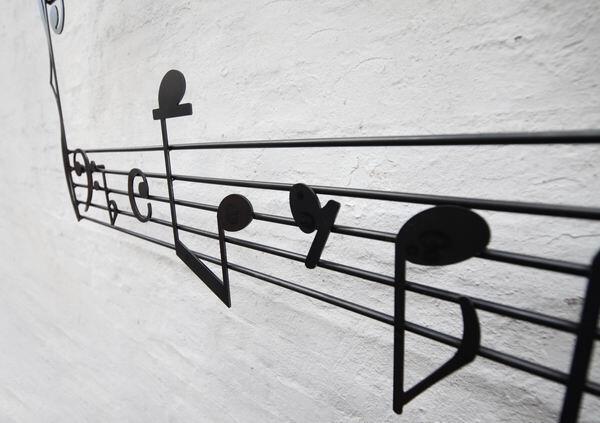 Dekoratives Notenrelief aus 3mm Stahlblech gelasert