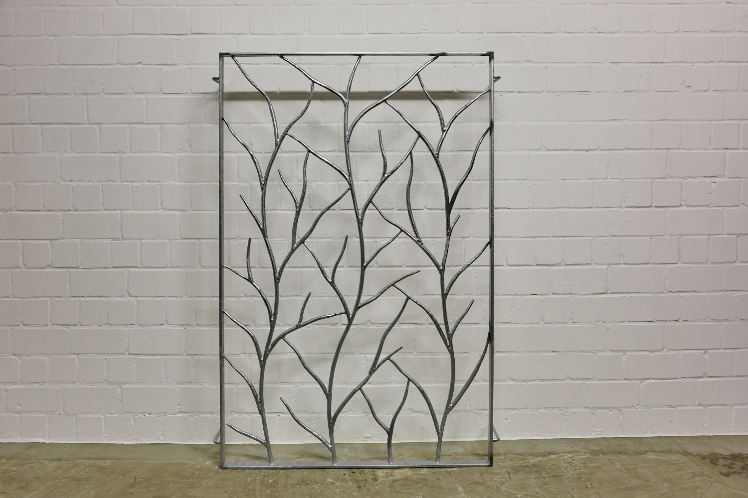 handgeschmiedetes Astgitter