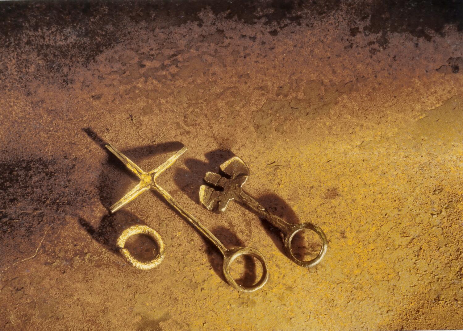 3 Ringe aus Eisen und Gold