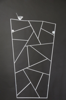 Rankgitter mit gelaserterm Vogel