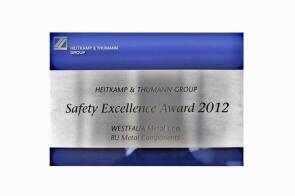 Safety Excellence Award 2012 aus Edelstahl, anlassbeschriftet auf Acrylglas