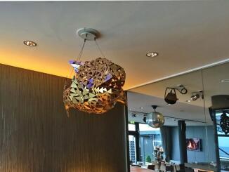 Fischskulptur aus kleinen Blechdreiecken geschweißt