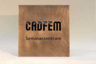 Werbeschild "CADFEM " aus Tombak mit lackierter Gravur