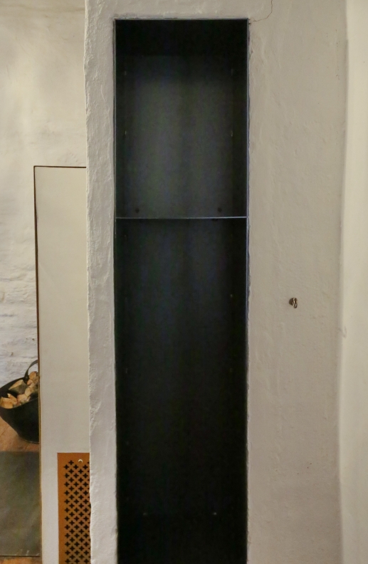 Tombakverkleidung für einen Kamin