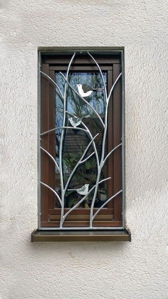 Fenstergitter mit Vogel Dekoration