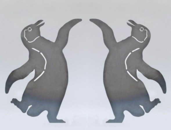 Tanzende Pinguine aus 3mm Stahlblech gelasert, nehmen im Laufe der Zeit eine schicke, rostige Patina an
