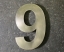 Hausnummer "6A" aus Tombak
