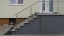 Treppengeländer mit Vordach und seitlichem Windschutz