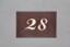 "28" hinterleuchtete Hausnummer aus Tombak