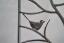 Kleines handgeschmiedetes Gitter mit einem Vogel
