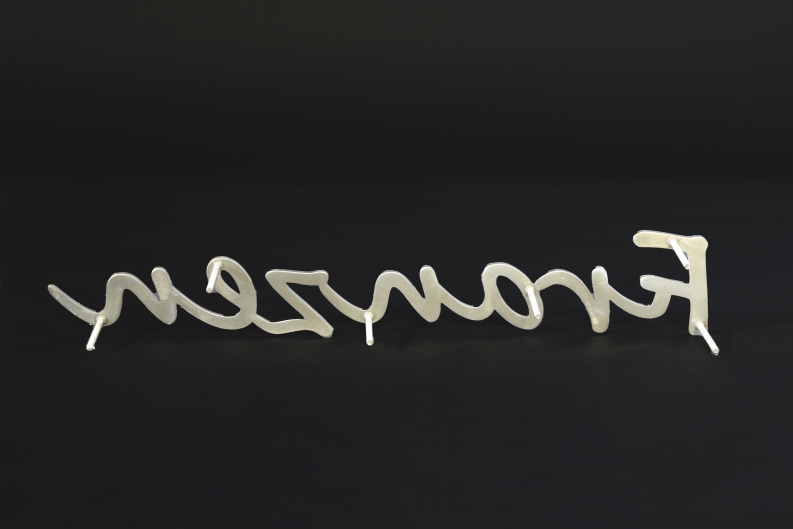 Schreibschrift aus Edelstahl