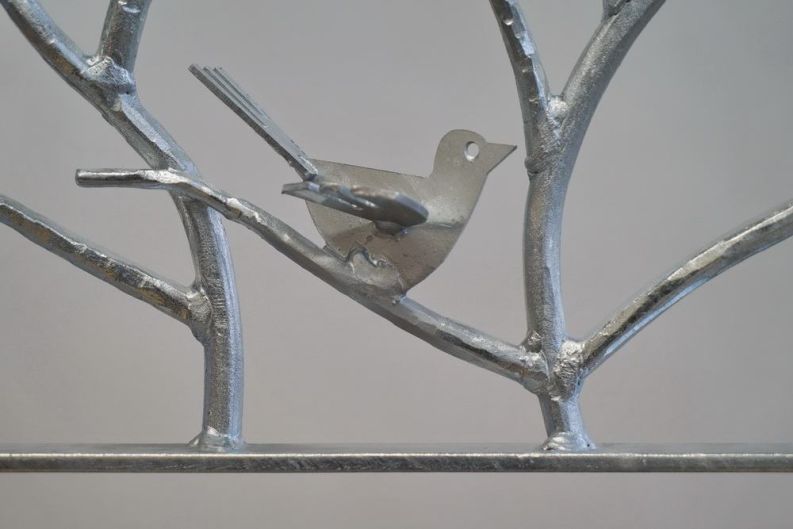 geschmiedetes Vogelgitter