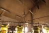 Kronleuchter aus Weinflaschen und Rundstahl für die Nil WEIN kost BAR in Hildesheim