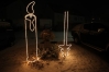 Kerze aus Rundeisen geformt und mit einem Lichtschlauch nachgezeichnet